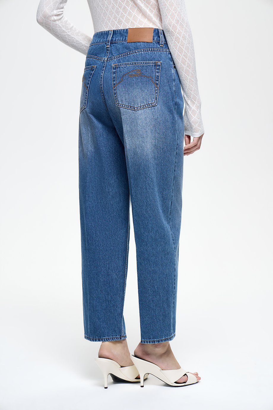 Джинсы Tapered Fit