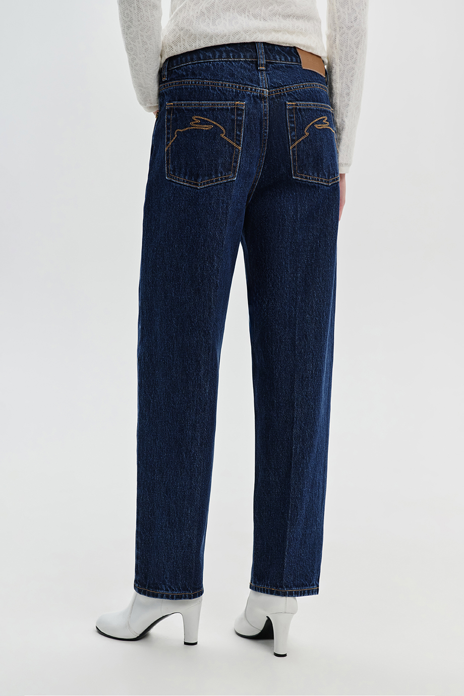 Джинсы Tapered